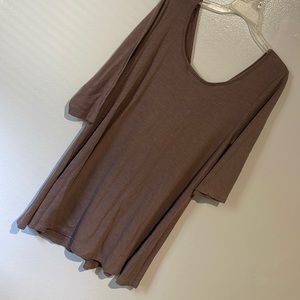 Tan Mid sleeve V Neck sweater long so may be a dress